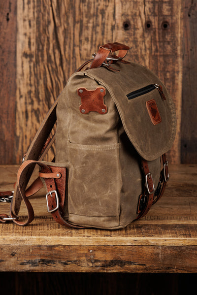 camera backpack leather Sakk Gear Everyday Slimpak 28L it has multiple pockets Saddle Brown- Bahia Camera Backpack